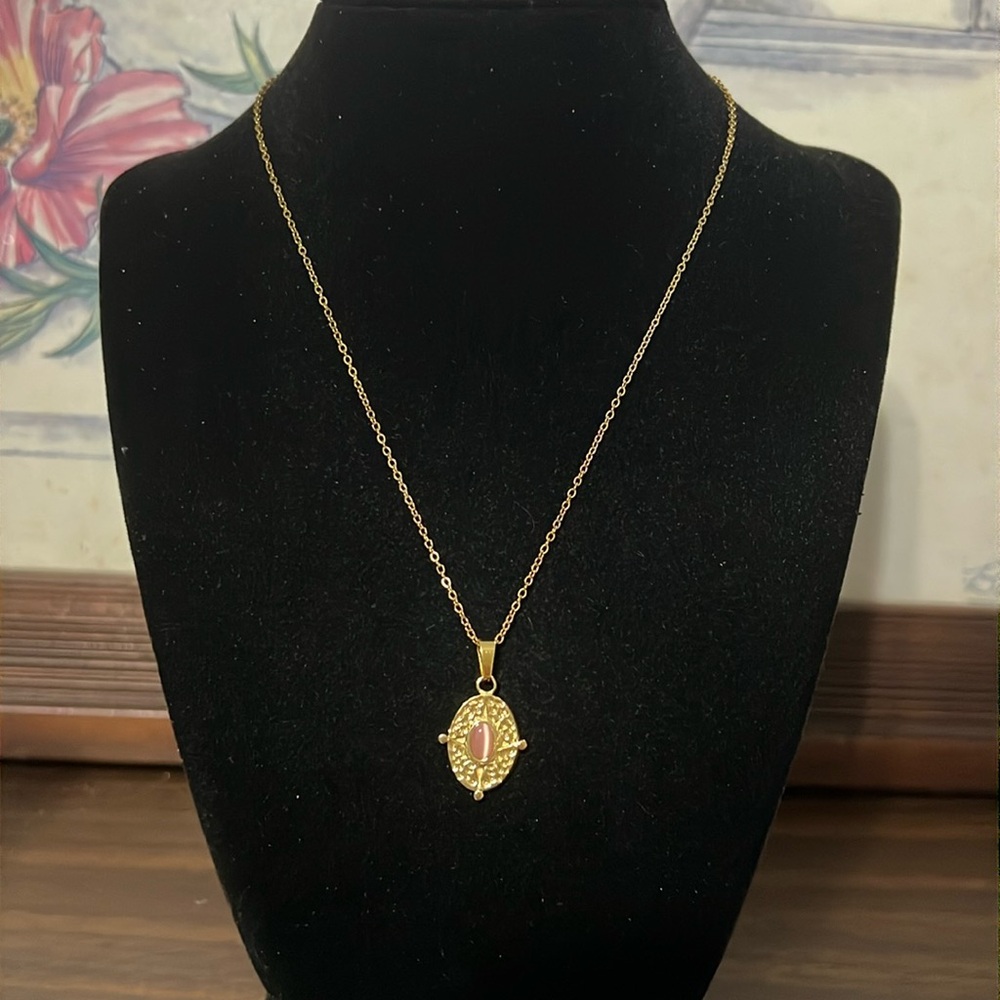 Gold plated stainless steel oval pink and gold pendant necklace